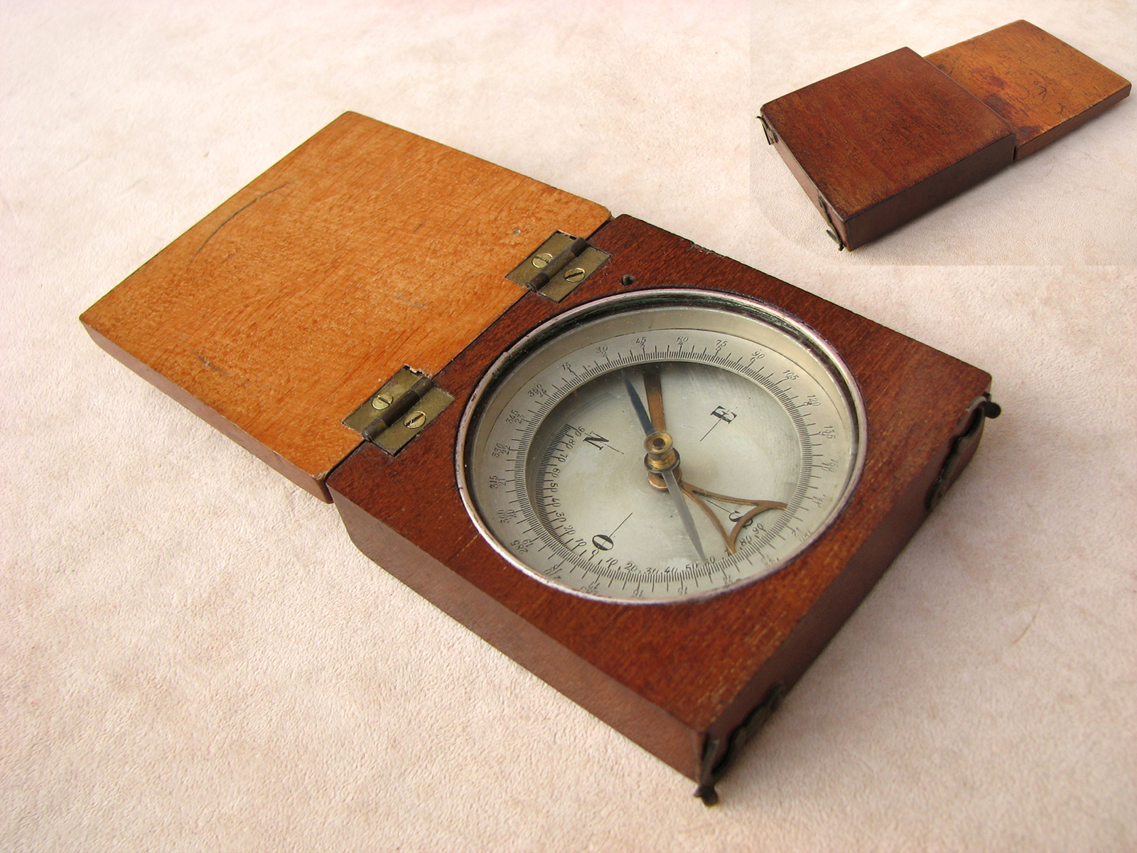 Mahogany cased compass with clinometer arm